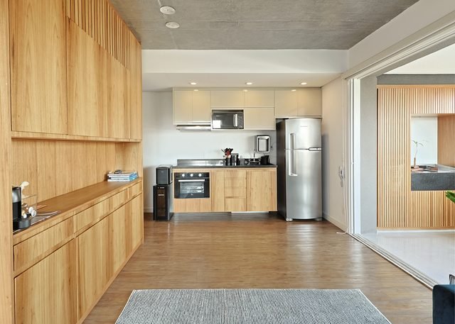 Cozinha integrada ao living em conceito aberto
